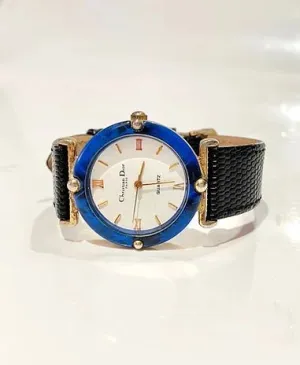 1980S CHRISTIAN DIOR BLUE STONE ROUND DIAL QUARTZ WATCH