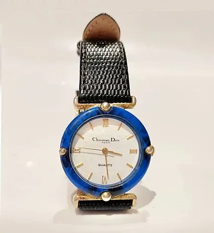 1980S CHRISTIAN DIOR BLUE STONE ROUND DIAL QUARTZ WATCH